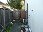 side yard on the right/garage side of the house