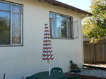 bottom of the steps, looking right at livingroom and master bedroom windows