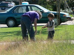 YaiYai helps Uncle Jim weed