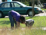 YaiYai helps Uncle Jim weed