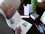 Grampy signs the guest book