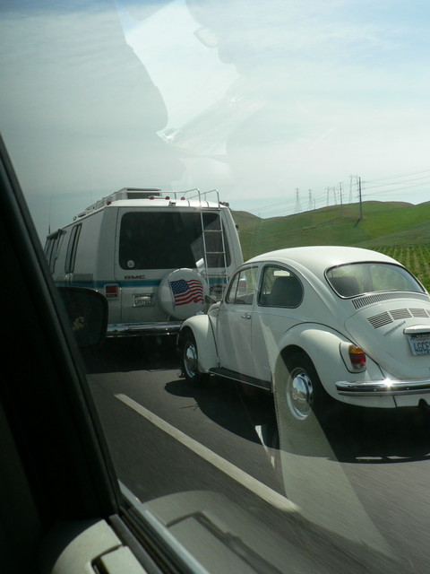 old camper with old bug