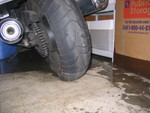 the whitish mark on the back tire matches the water line on the box.  and you can see pooled water, still, too.