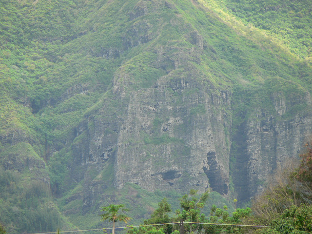 a big gaping hole in a giant cliff face