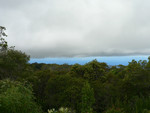 can you see Ni'ihau in the distance, just under the clouds?