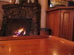 we sit on a sofa in the bar, by the fireplace