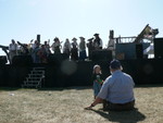 Dogs on stage, with Tyler Anne and grandpa watching