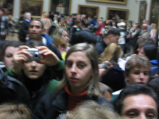 the swarming hordes behind me
as I photograph Mona Lisa