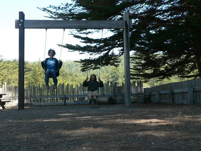 swinging at the playground near One-Eyed Jack's