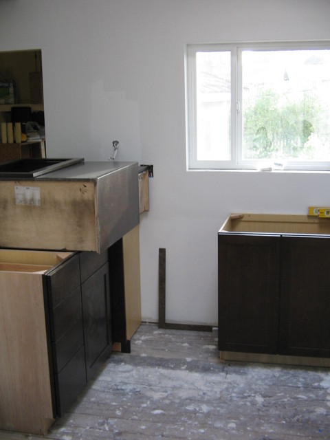 The gap for the dishwasher and the sink to the right of that