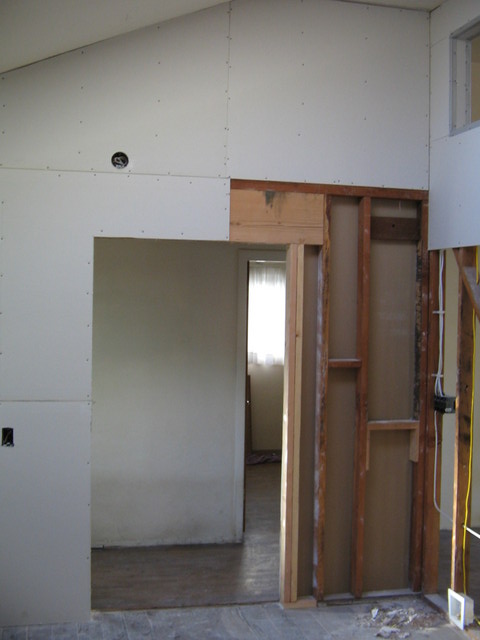The opening by the front door with wiring for the center light