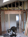 A new header was built above, a new beam, and the doorway to the kitchen is now only 4ft wide.