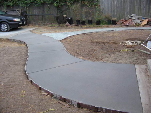 Side view of the path which shows it leading to the driveway area.