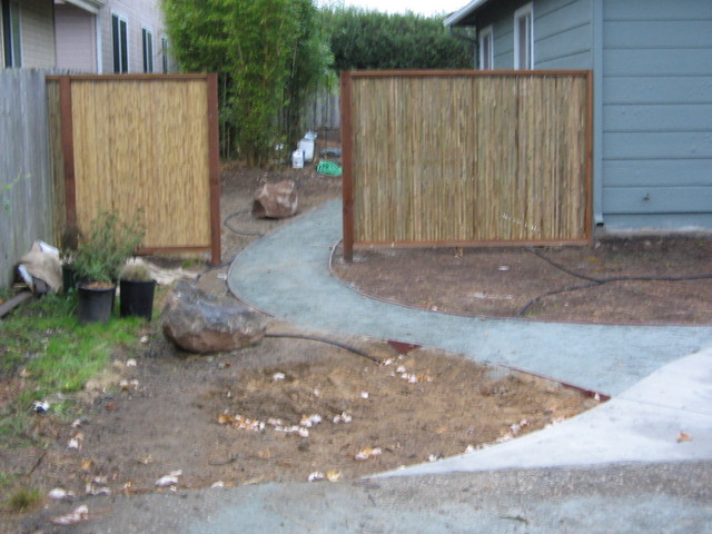 The new fence that leads to the back yard