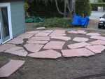 Flagstones out front. They aren't done with the puzzle yet.