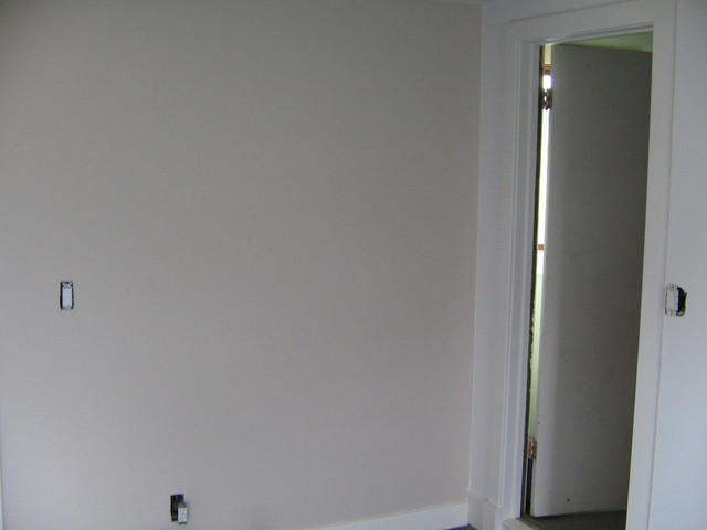 The new wall color by the door to the room.